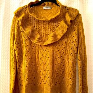 Mustard yellow knit sweater from Paris, France. Worn once on shoot.